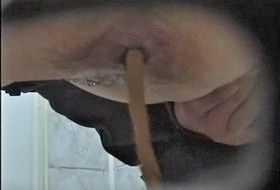 Girl takes a big shit on toilet